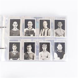 Collection of Edwardian and later Football related trading and cigarette cards, including forty-nine of fifty 1906 Ogden's Football Club Colours, 1922 PALS Footall series, ninety of one hundred 1925 Gallaher Famous Footballers, complete set of forty-four 1926 Ogden's Captains of Association Football Clubs and Colours, complete set of fifty 1927 Players Football Caricatures by MAC,  complete set of fifty 1927 Players Football Caricatures by RIP,  complete set of fifty 1930 Players Association Cup Winners, complete set of 50 1933 Ogdens AFC Nicknames etc, housed in brown cigarette card album