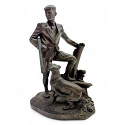 Heredities figure group 'Taking a Break', depicting man with shotgun and gun dog, in bronz...
