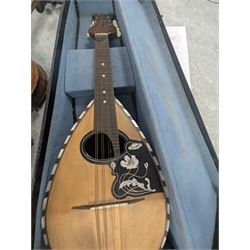 Two violins, including Excelsior example in coffin case and one with spurious William Duke label, and a Luigi D'Ancora mandolin