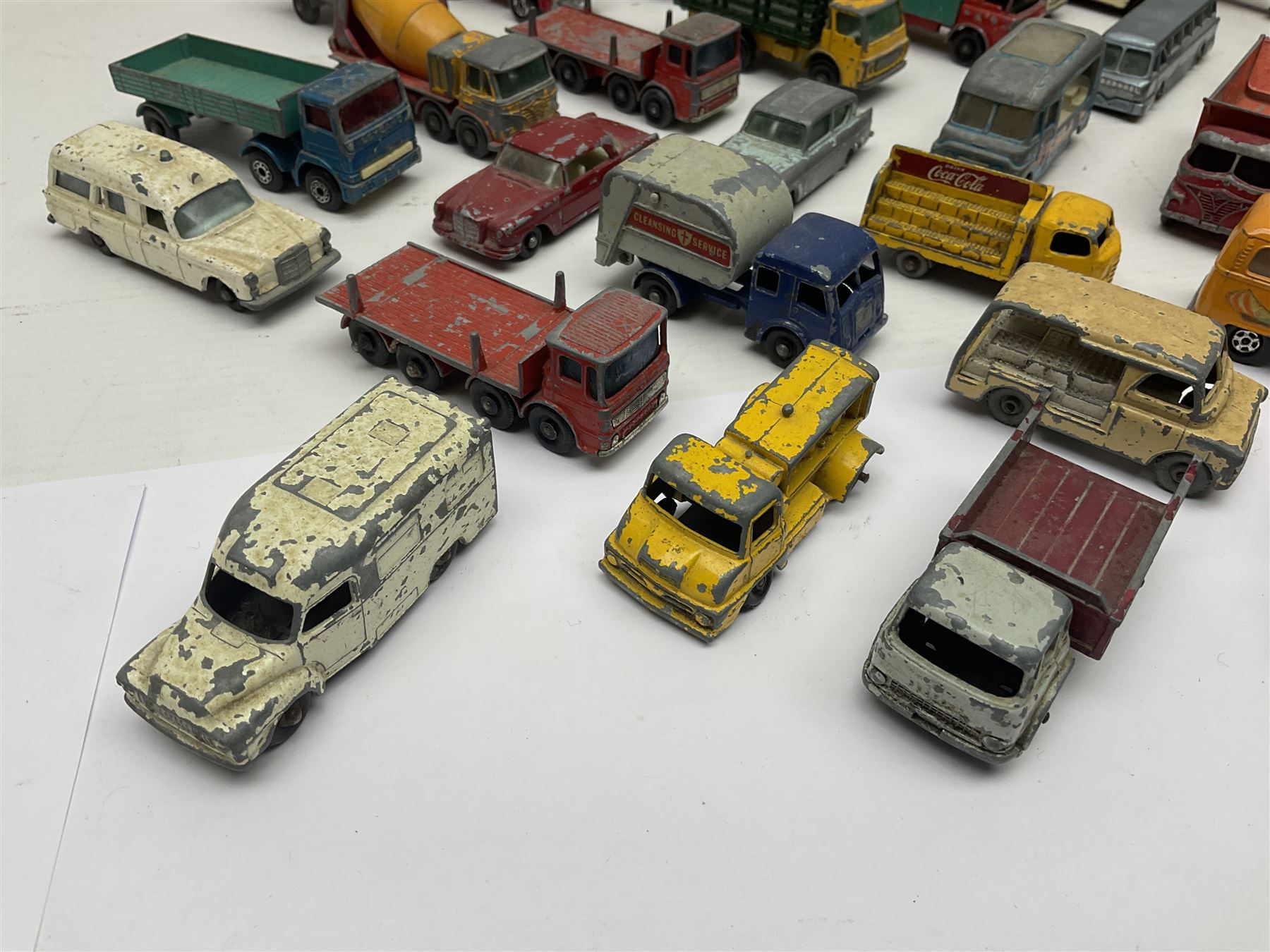Lesney - approximately forty nine unboxed and playworn die-cast models of various scales with examples from the ‘Matchbox Series’ such as Mercedes Truck No.1, Mercedes Benz ‘Binz’ Ambulance No.2, Stake Truck No.4 etc; further models to include ‘Models of Yesteryear’ 1910 Benz Limousine Y-3, Bedford 7 1/2 Ton Tipper Van No.2, Ford Anglia No. 7 etc 