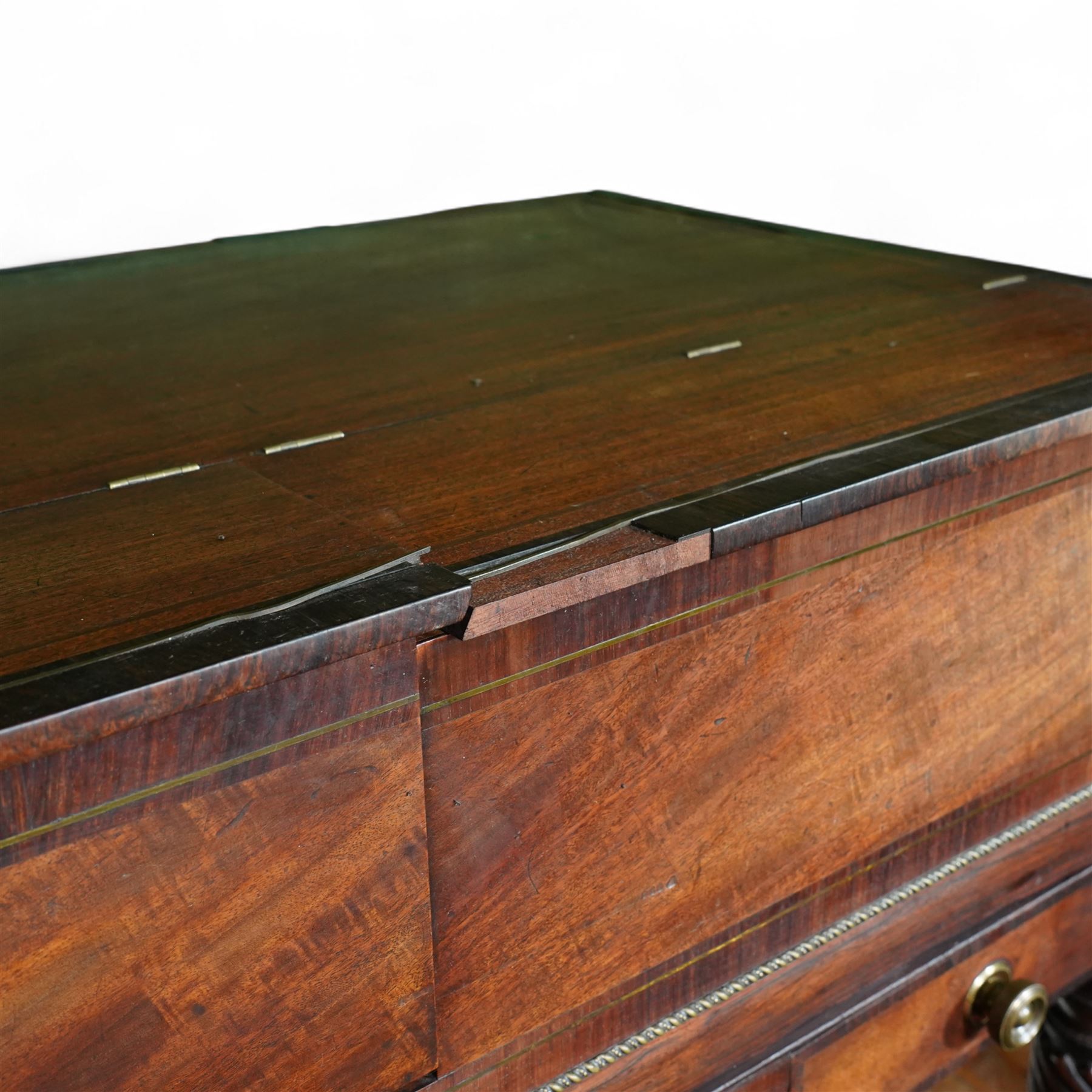 Early 19th century George IV Square Piano by William Rolfe & Co, 112 Cheapside, London, c1821. Mahogany veneered case with rosewood crossbanding and brass stringing, with sustain pedal and reeded legs on a tapered spiral with brass capitals, with three music draws beneath and a folding duet music stand, nameboard with makers name on a round gilt medallion and open silk backed fretwork to the ends, serial No 6699, double strung, English double action with 68 ivory and ebony keys, F1-C7. original strings, hammers and dampers, soundboard and bridge in good condition, with original makers written instructions on regulating the action and tuning the piano attached to the inside of the instrument. In good condition, however the action is in need of regulation and tuning.
William Rolfe is thought to have been in business between 1785 and 1828. 
Given the intricate nature of these historic instruments, specialist support will be available if required, to assist successful buyers with safe removal and onward handling. Price upon application.


This item has been registered for sale under section 10 of the APHA Ivory Act Reference PB6GL6SZ