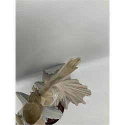 Lladro figure group, 'Merry Ballet', modelled as two ballerinas in dancing pose, raised on a turned socle base, no. 5035, printed marks beneath, H49cm