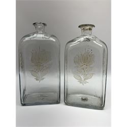Pair of Georgian glass spirit decanters, of straight sided form with rounded shoulders, each side engraved with flowers and heightened with gilt, each approximately H20cm 