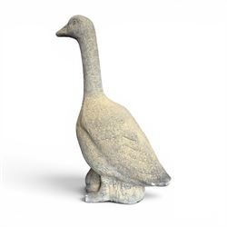Large cast stone garden statue modelled as a standing goose on a naturalistic base