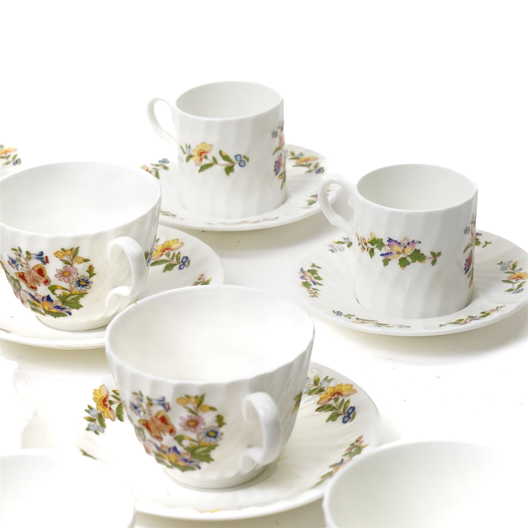 Aynsley Cottage Garden tea set comprising thirteen cups and saucers, eleven plates, bread and butter plate and milk jug, together with six coffee cans and saucers, cream jug and sugar bowl and four other Cottage Garden pieces