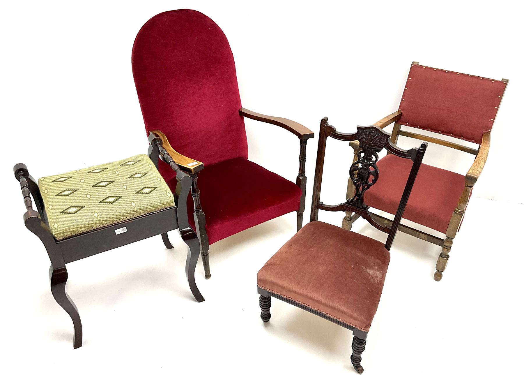 Edwardian mahogany nursing chair, carved and pierced back, upholstered seat, turned supports (W46cm) a low armchair upholstered in a red fabric (W67cm) a piano stool and another armchair (4)