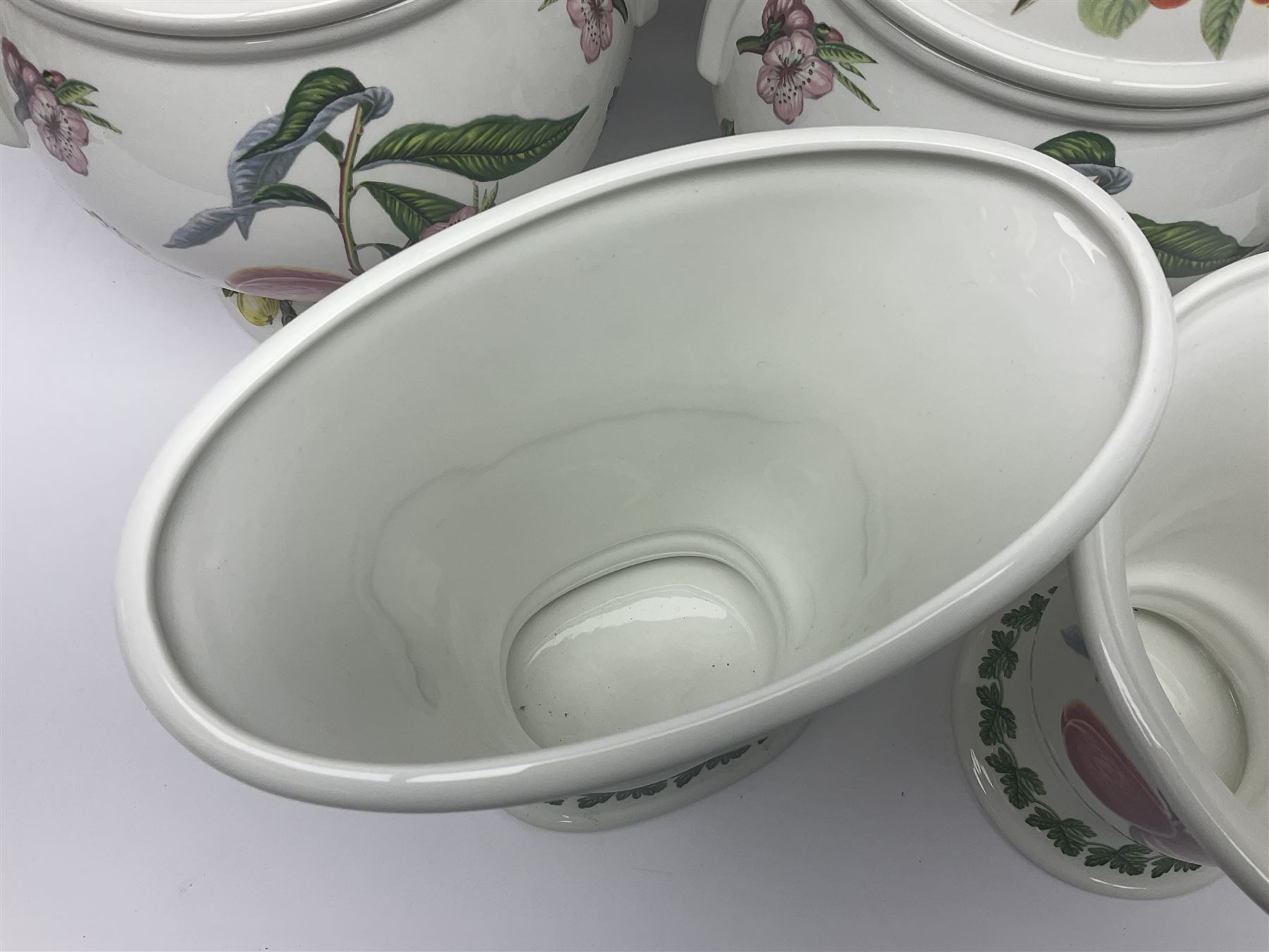 Three Portmeirion soup tureens with covers and ladles, together with vases, large bowls and other Portmeirion items