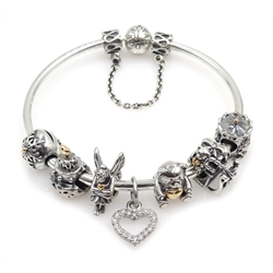 Pandora silver charm bracelet, with six silver and 14ct gold Pandora charm and one silver Pandora charm, all stamped S925 ALE    