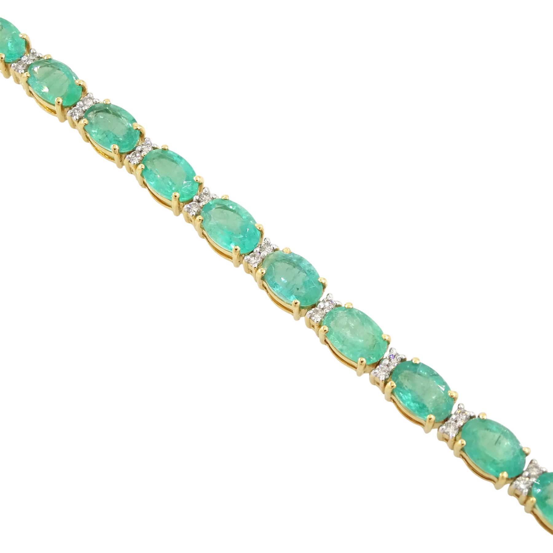 18ct gold emerald and diamond bracelet, twenty-seven oval cut emeralds, each spaced by two round brilliant cut diamonds, stamped 18K, total emerald weight approx 12.35 carat, total diamond weight approx 0.50 carat