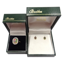  Black cabachon opal and diamond gold cluster ring, stamped 18ct and matching pair of stud earrings both purchased from Boodle and Dunthorne. boodles  