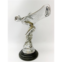  A cast Rolls Royce Spirit of Ecstasy car mascot, raised upon a circular stepped wooden base, H36cm.   
