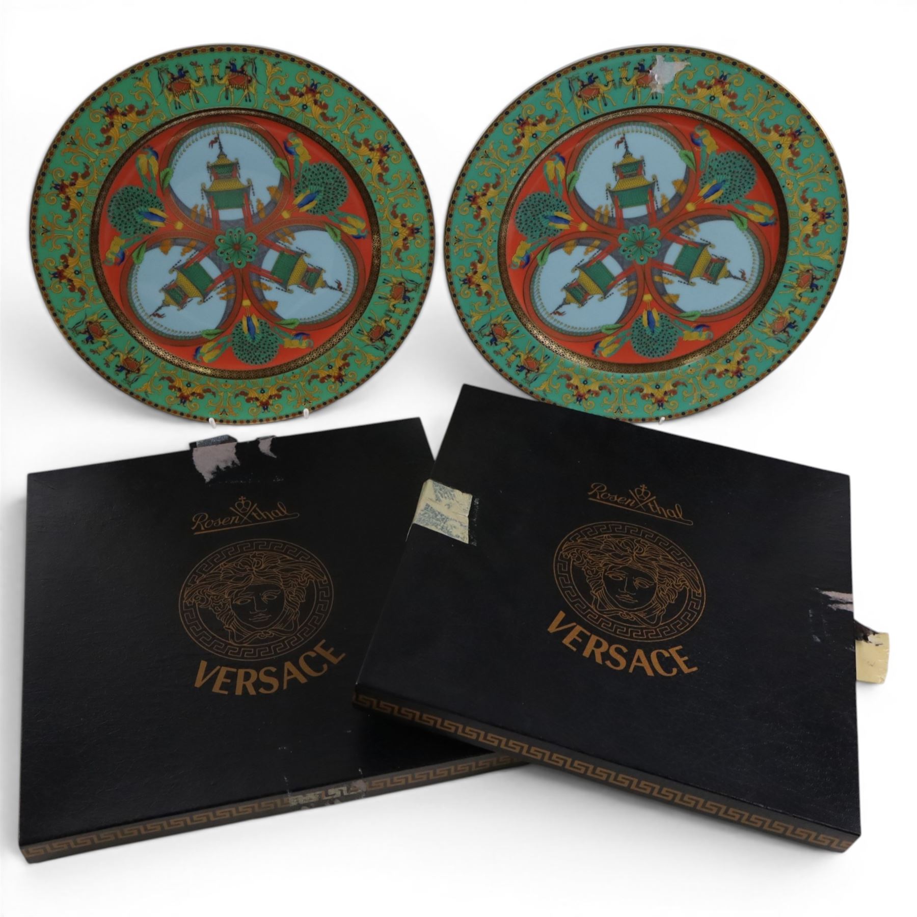 Rosenthal Versace pair of Le Voyage de Marco Polo plates, both boxed, D31cm