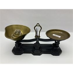 Black painted and brass kitchen balance scales with graduated set of brass weights