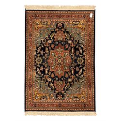 Belgian Sultan woollen ground rug, central navy field densely decorated with floral sprays and geometric patterns (192cm x 135cm); handwoven tribal terracotta ground rug (121cm x 71cm); Persian crimson ground runner, all over stylised floral and foliate motifs (266cm x 94cm)