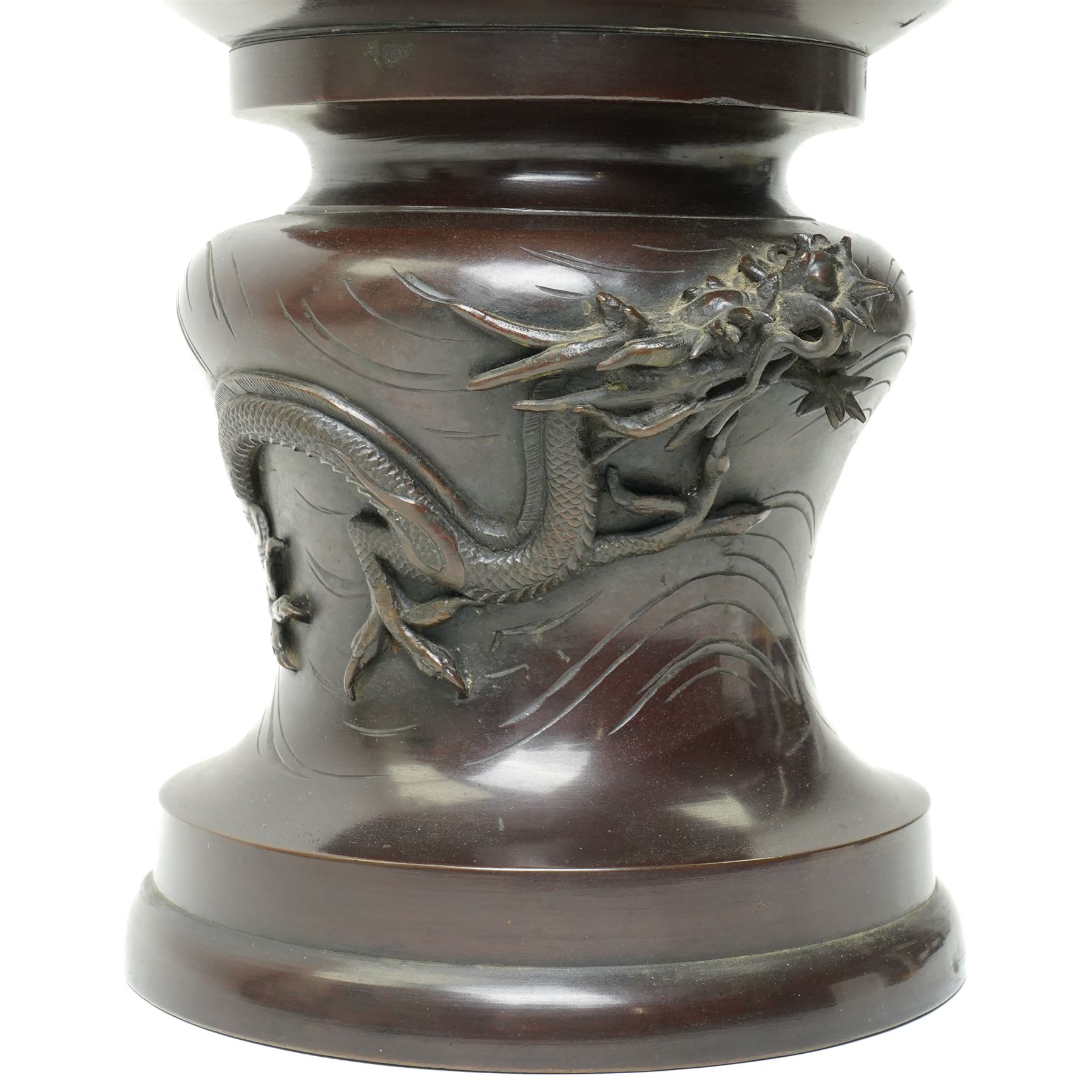 Japanese late Meiji period bronze koro and cover, surmounted by an eagle finial and with bird decoration in high relief to each side, twin elephant trunk handles, bearing indistinct character signature to one side, H82cm