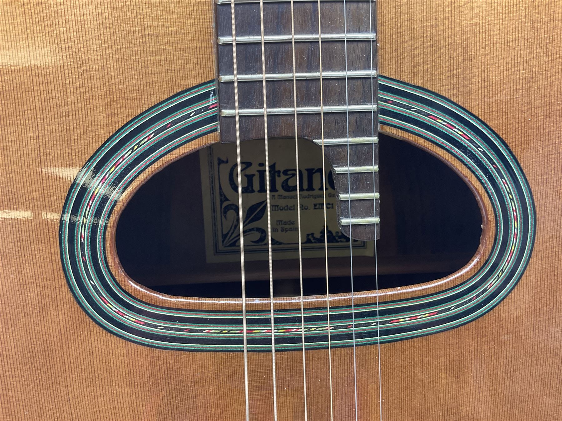 Spanish Gitano Manuel Rodriguez EMC1 Maccaferri acoustic guitar, c2000, the cedar top with D-hole, L98cm overall; in lightweight hard carrying case.