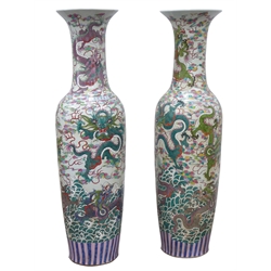  Large pair 20th century Cantonese floor vases, flared rim and tapering cylindrical form, decorated with dragons, H142cm  
