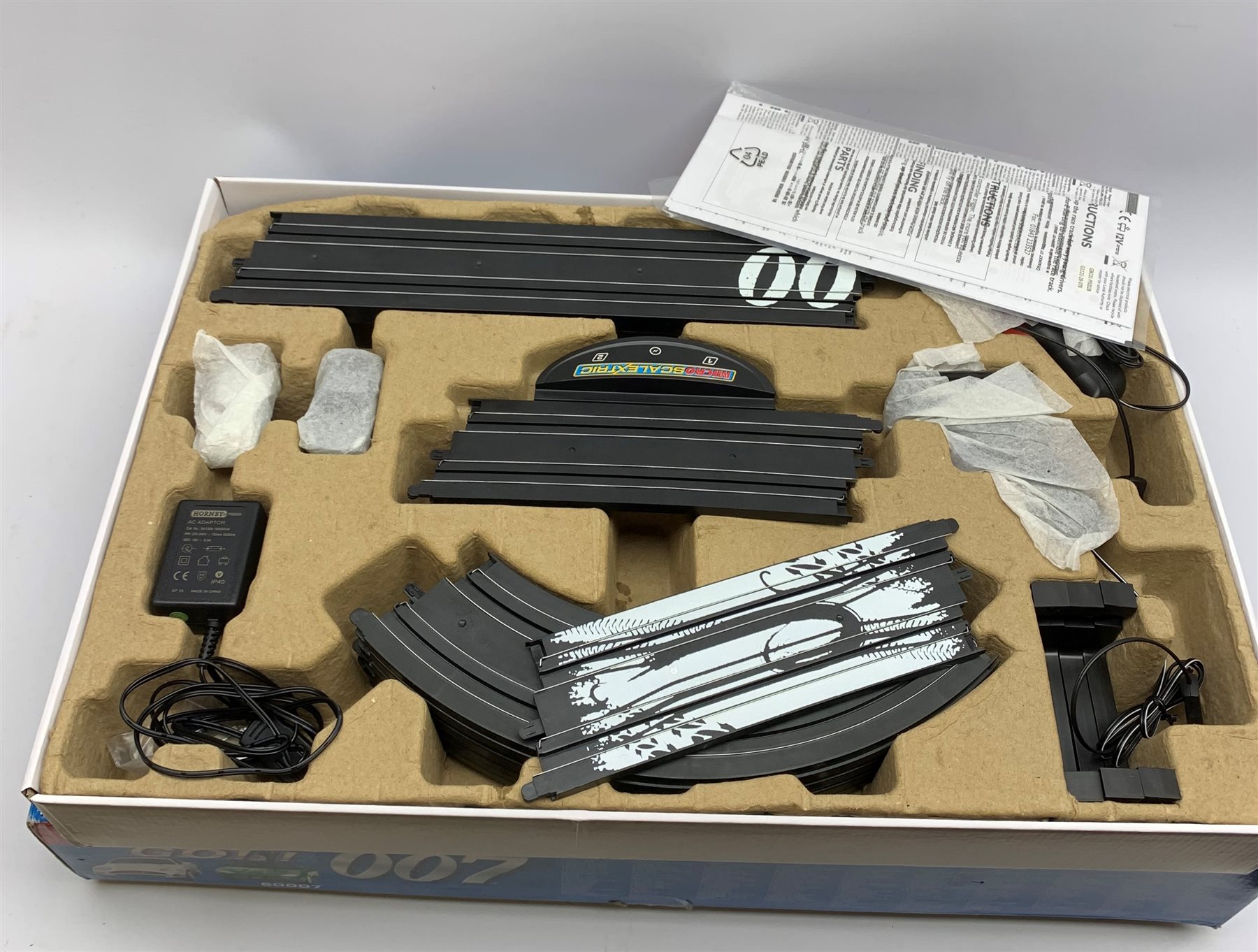 Carrera Go James Bond Die Another Day slot-car racing set No.60007; and MicroScalextric James Bond Aston Martin DB5 and DBS racing set, both boxed (2)