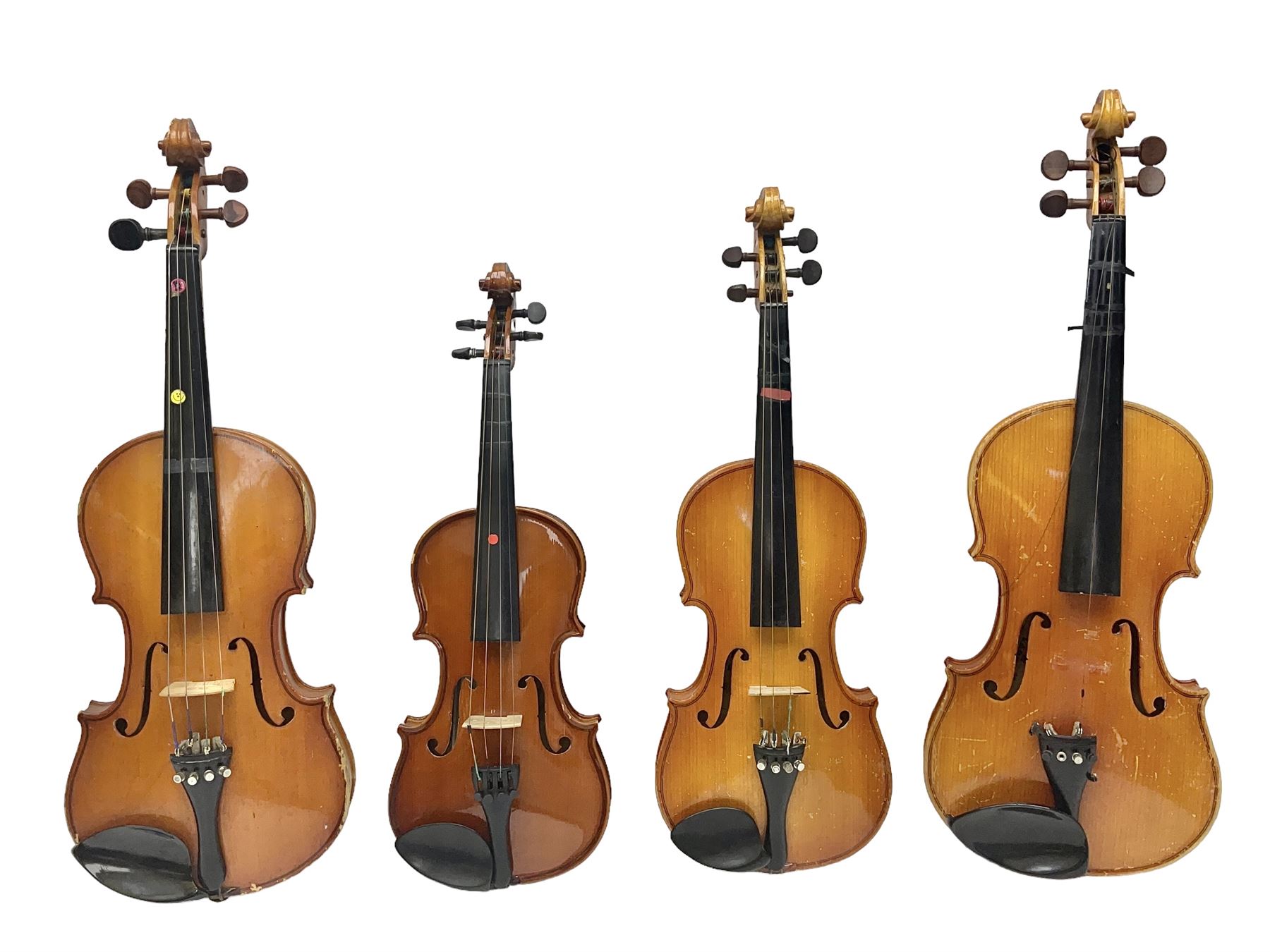 Four Chinese graduated violins - full size with 35.5cm two-piece back; three-quarter size with 33.5cm two-piece back; half size with 31cm two-piece back; and quarter size with 27.5cm two-piece back; all cased except full size; one with bow (4)