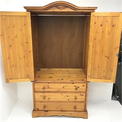 Solid pine wardrobe, shaped projecting cornice, two doors above three drawers, plinth base, W104cm, H193cm, D61cm 