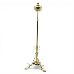 20th century brass standard lamp, urn form reservoir top with hinged cover, on a slender c...