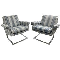 Pair of mid-20th century cantilever armchairs, upholstered in striped blue and silver fabric, raised on a chrome base