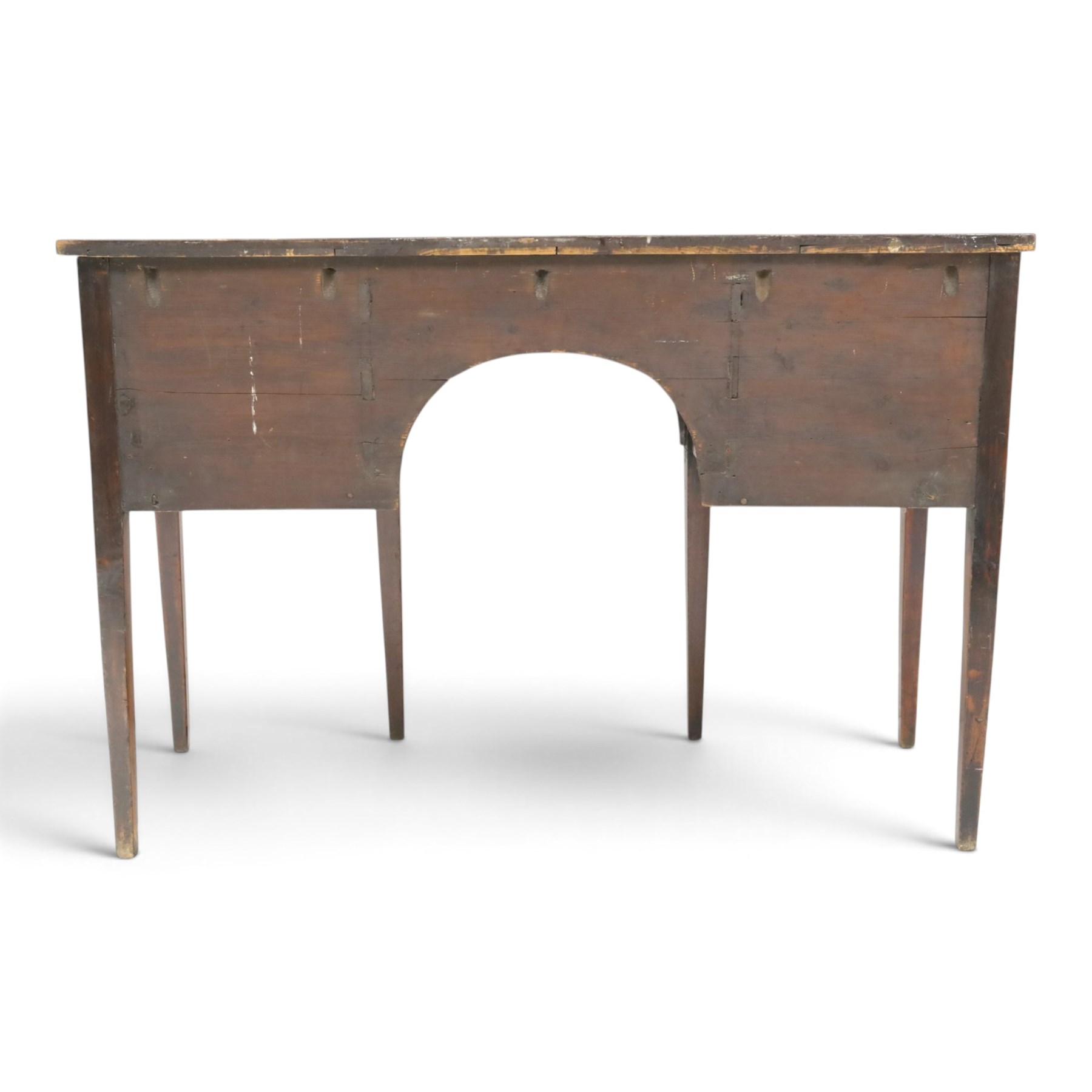 Regency period inlaid mahogany bow-breakfront sideboard, shaped rectangular top with crossbanding and ebony stringing, central convex frieze drawer flanked by cupboard and cellarette drawer, over fan-inlaid spandrels, raised on square tapering supports