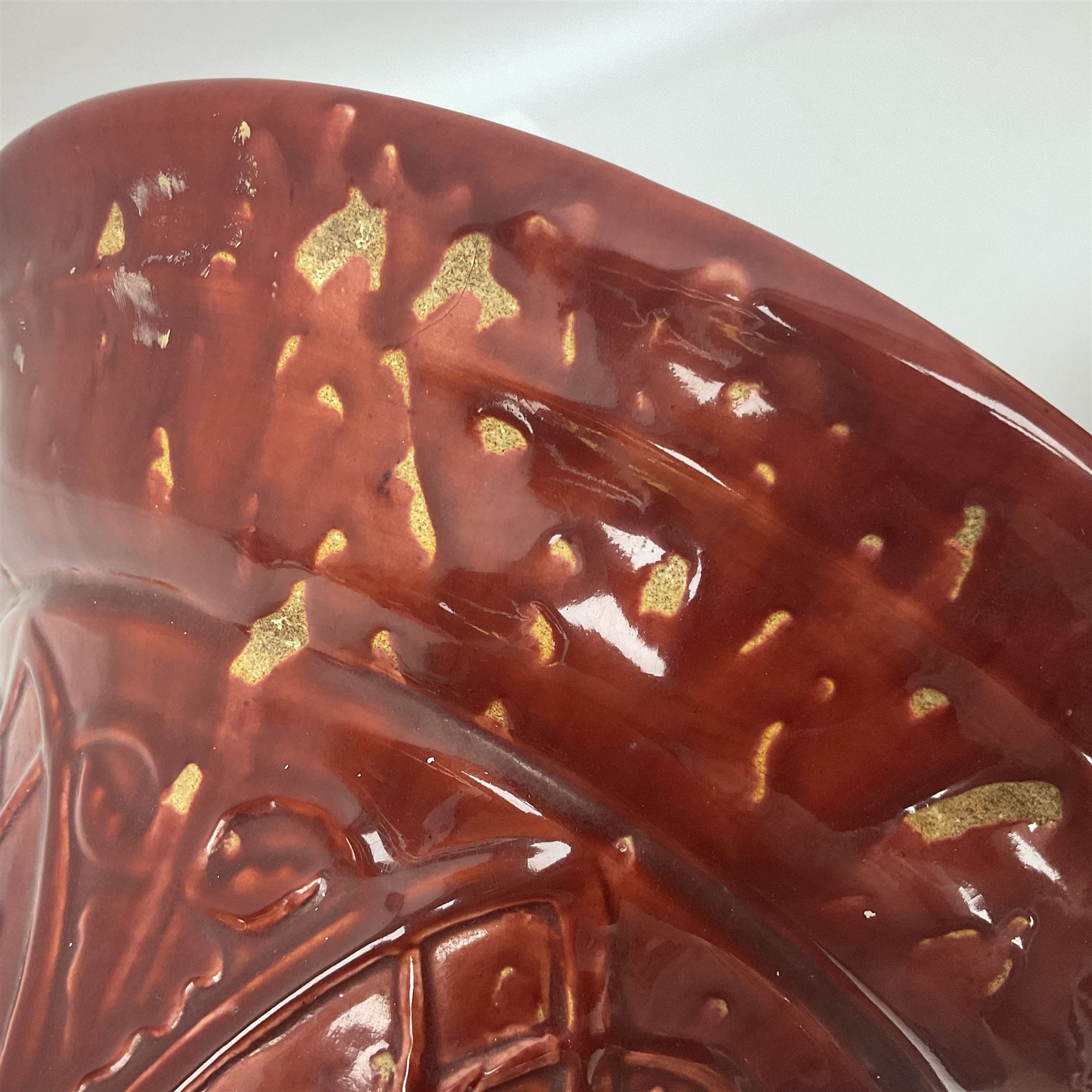 Bretby Jardiniere and stand, with foliate and foliage decoration with a red and yellow ground, impressed mark beneath H94cm