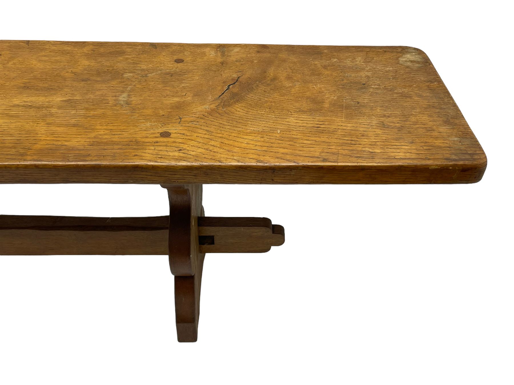 Gnomeman - adzed oak narrow bench, rectangular seat on shaped end supports united by pegged stretcher, carved with gnome signature, by Thomas Whittaker, Little Beck 