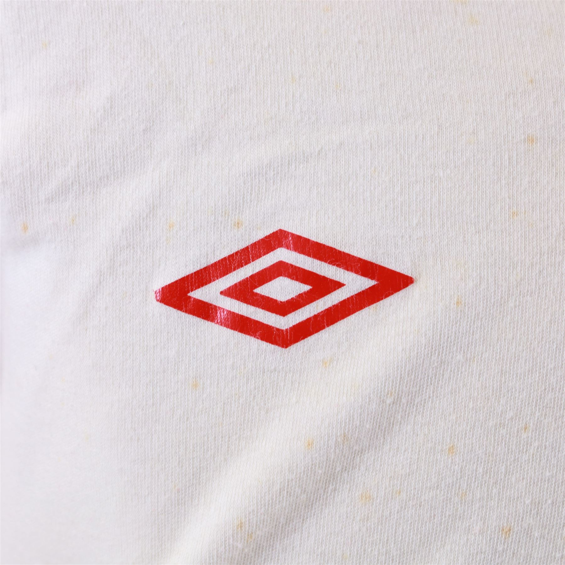 1960s Scarborough FC long sleeved football shirt, all white with red cuffs and collar, red umbro logo, stitched red SFC logo and red number 13 to back, with Umbro International label inside collar