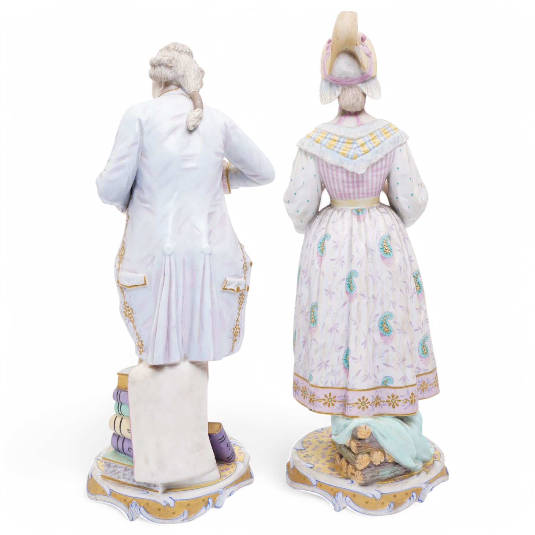 Pair of French bisque figures, possibly by Vion & Baury, modelled as a scholar and a lady carrying a tea, both with green anchor marks to base, H41cm