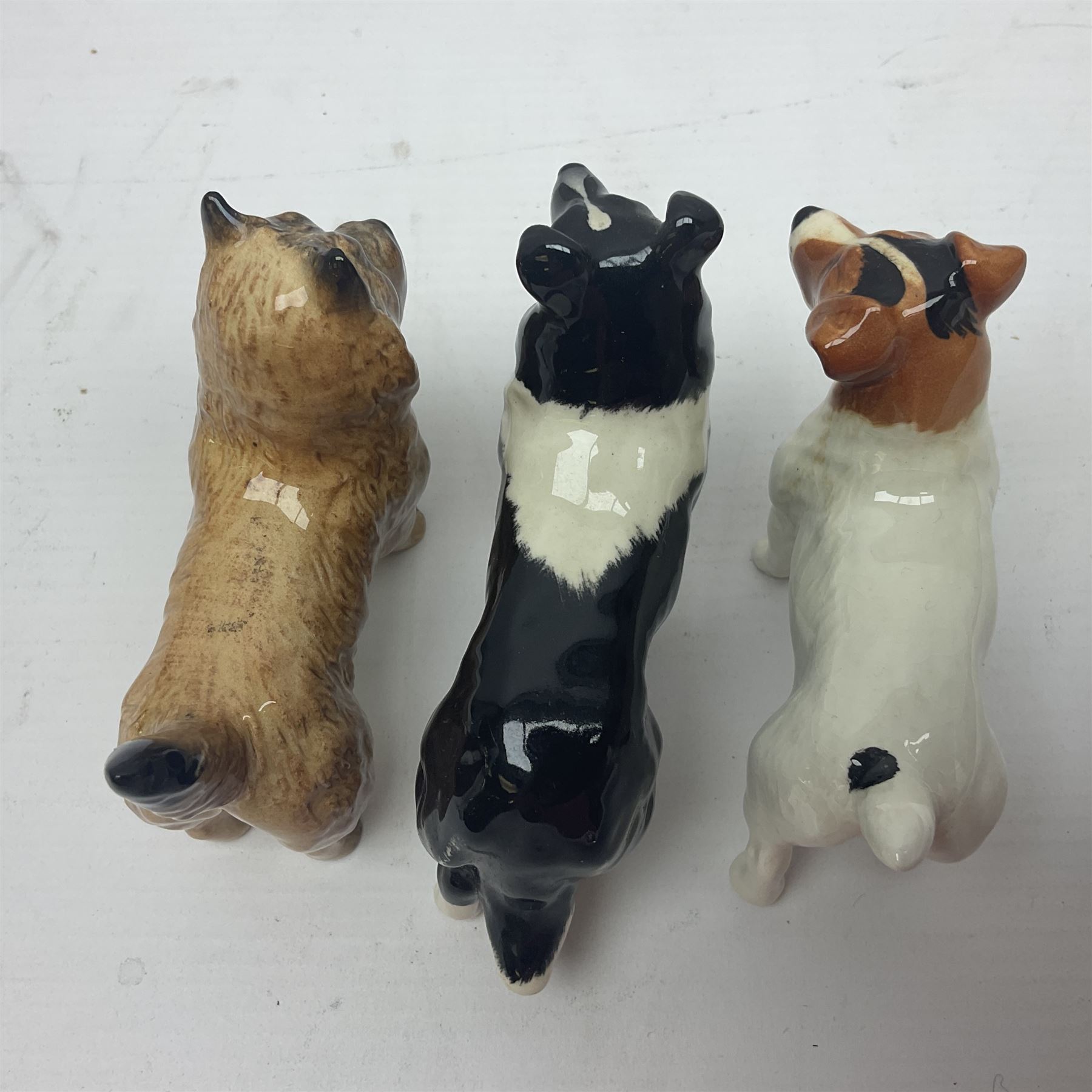 Seven Beswick figures, to include King Charles Spaniel 2107A, ginger cat 1898, Jack Russell 2109 etc