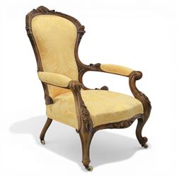 Victorian carved walnut open armchair, shaped and moulded frame with foliate carved cresti...