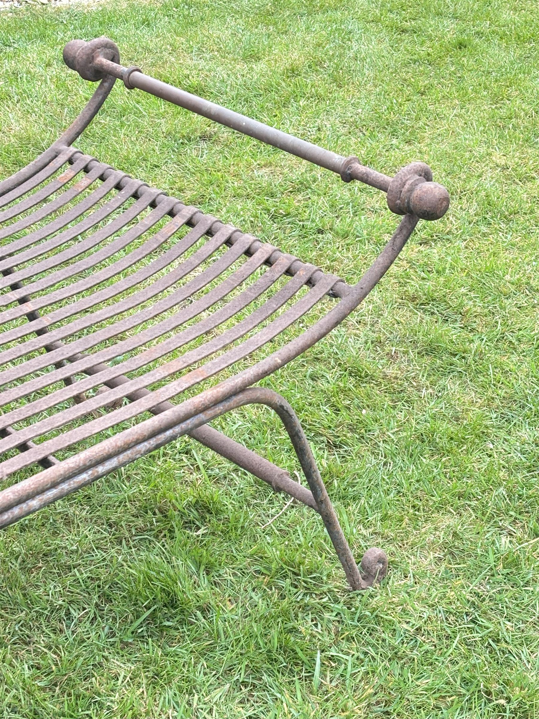Large scrolling wrought iron garden bench in the classical style. L178cm, D70cm, H60cm.  - COLLECTION BY APPOINTMENT FROM: The White House, Thirsk Road, Easingwold, York, YO61 3NF - CALL 01723 507111 TO ARRANGE