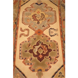  Turkish style rug, beige ground, (194cm x 144cm) and a chinese style rug, light green ground, (186cm x 122cm)  