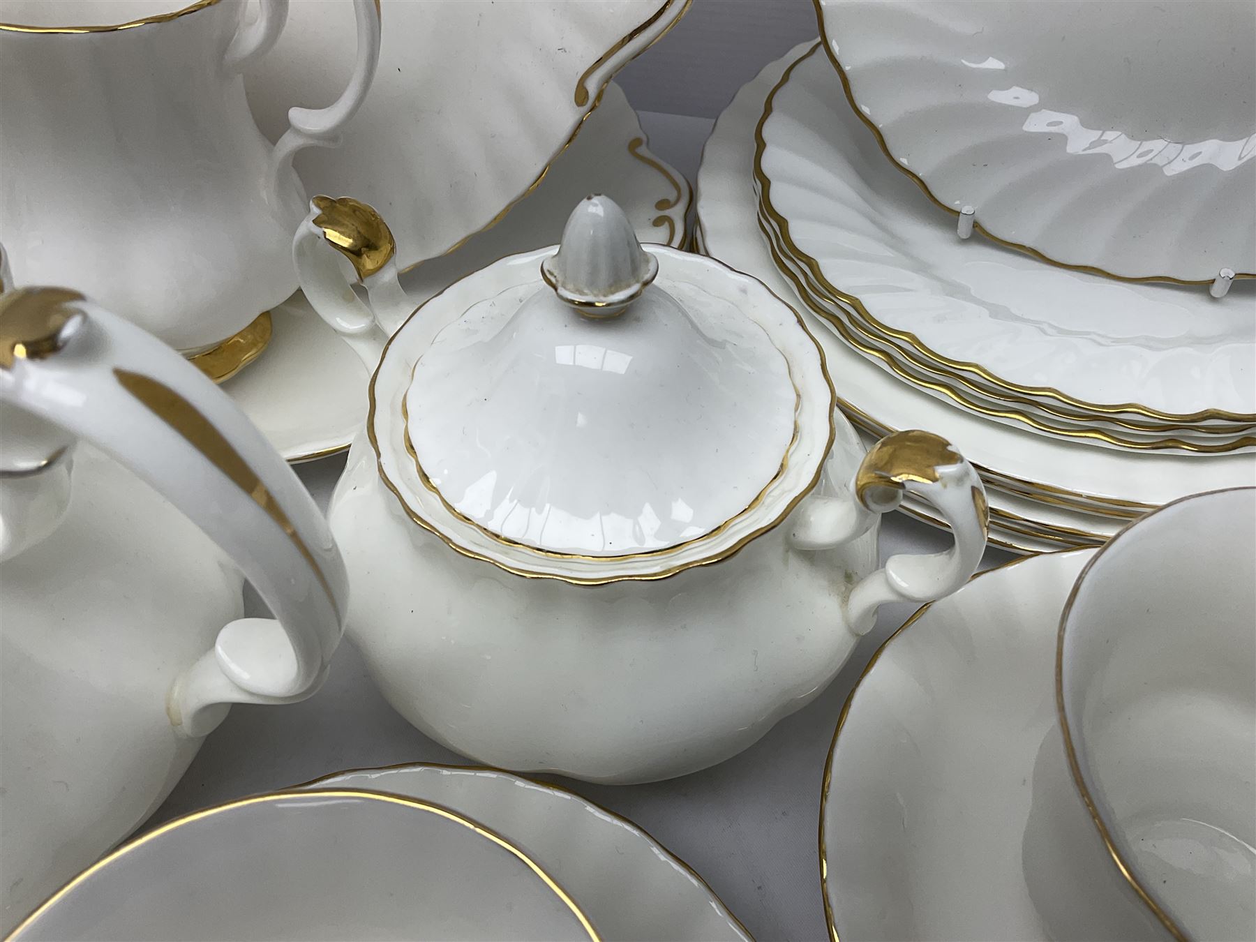 Royal Albert Val D'or pattern tea service for six, comprising teapot, milk jug, sucrier, six teacups and saucers, tea plates, side plates, dessert plates, etc (33)