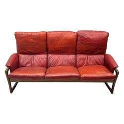 Folke Ohlsson for Gimson & Slater - mid-20th century Danish teak-framed sofa, red leather upholstery with patchwork design, raised on shaped teak side supports