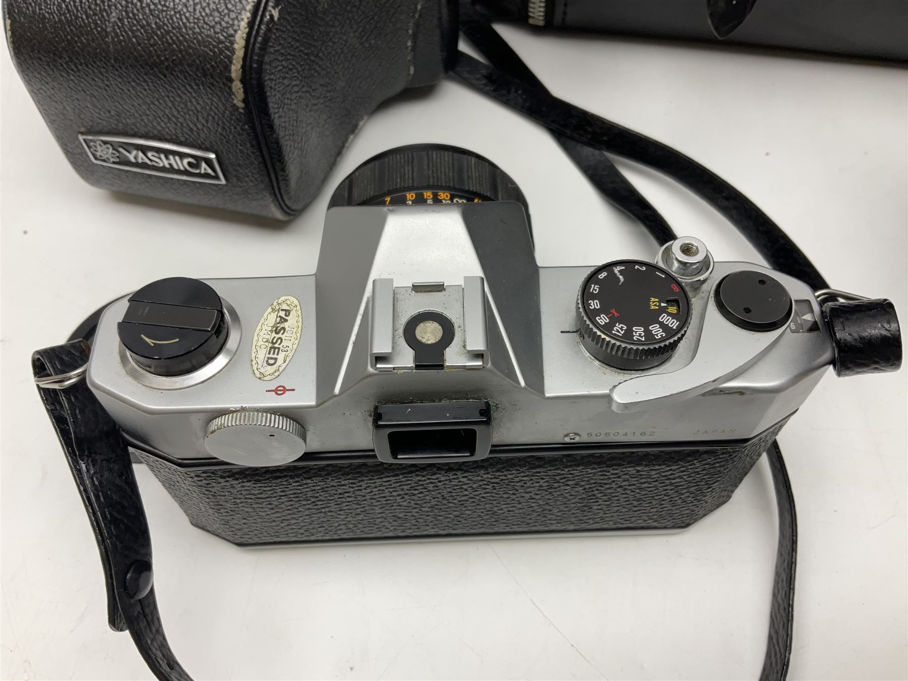 Yashica-A camera body, serial no. A4080073, with 'Yashikor 1:3.5 f=80mm' lens, serial no. 209272 and 'Yashikor 1:3.5f=80mm' lens, serial no 22942, together with Yashica TL-Electro camera body, serial no. 5054162 with 'Yashinon-DS 50mm 1:1.9  40056038