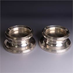 Pair of modern silver mounted candle holders, of circular stepped form, hallmarked Broadwa...