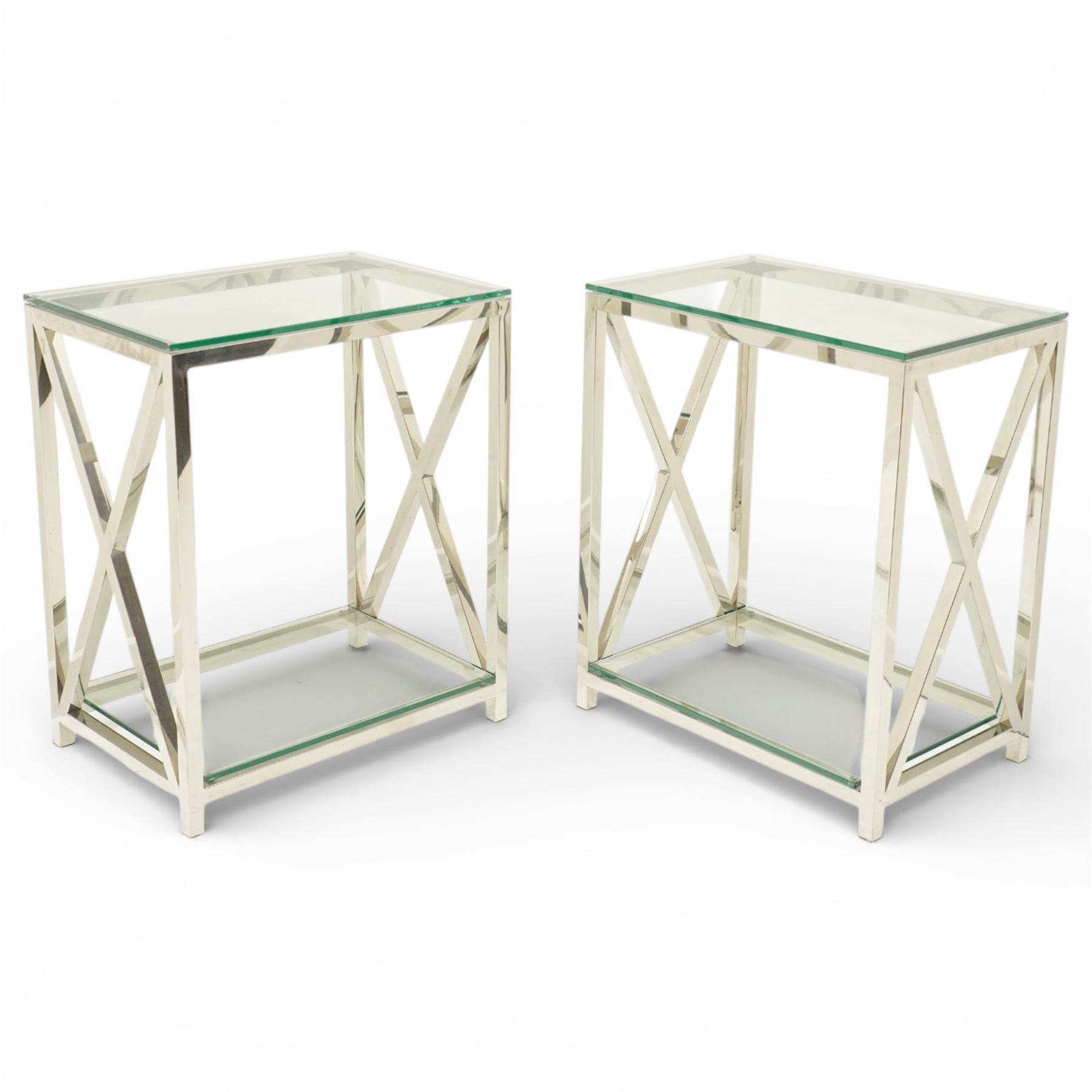 Pair of modern chrome lamp tables, rectangular plate glass top on polished chrome frame, the sides formed with X-frame stretchers, raised on square supports with lower glass tier 