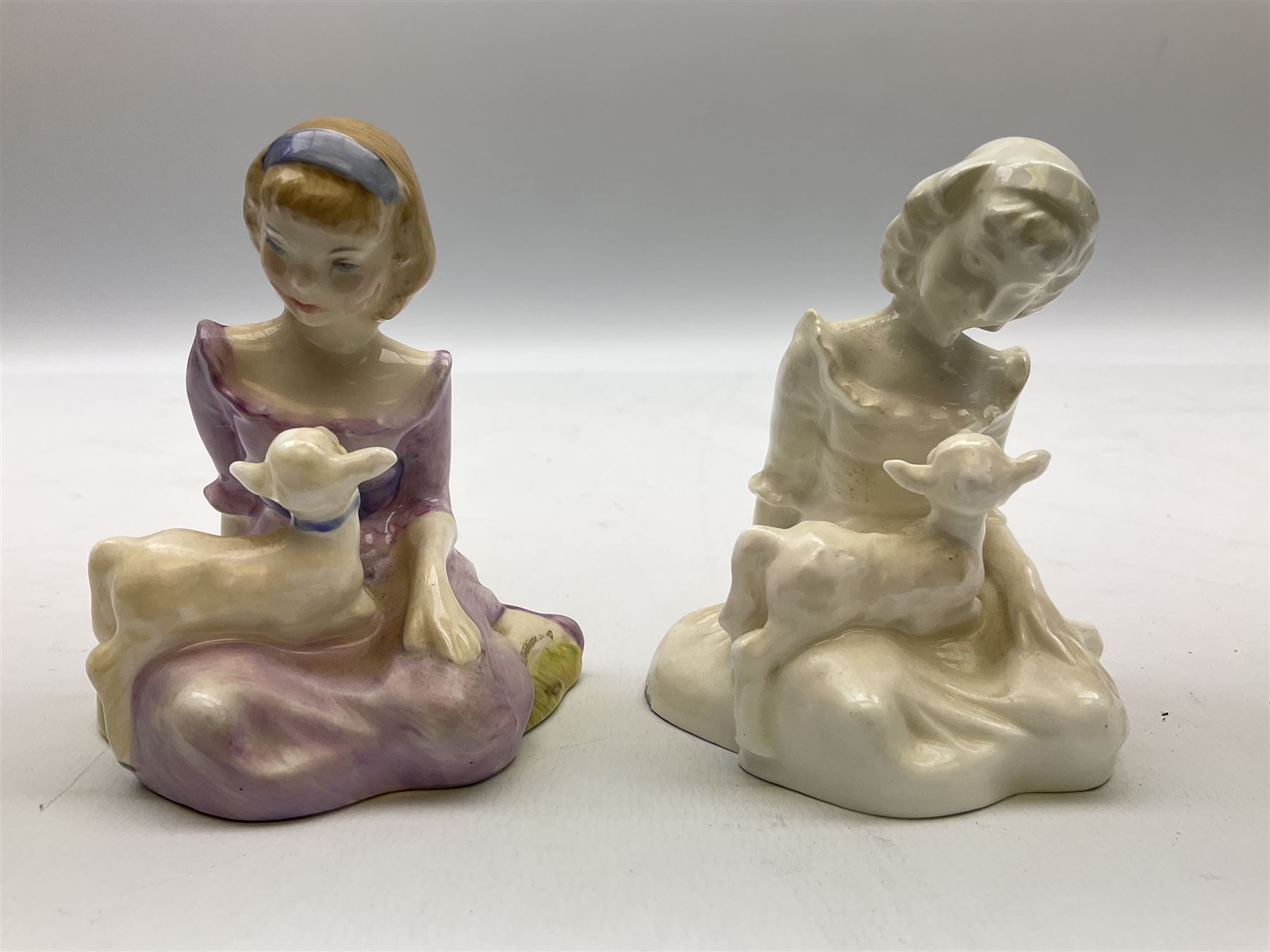 Seven Royal Doulton figures from the Nursery Rhymes Collection comprising, Tom Tom, the piper's son HN3032, Little Jack Horner HN3034, Wee Willie Winkie HN3031, Polly, put the kettle on HN3021, Little Bo-peep HN3030, Little Boy Blue HN3035, Little Miss Muffet HN2727, together with two Royal Doulton Mary had a little lamb figures HN2048 and COPR1948, all with printed marks beneath  