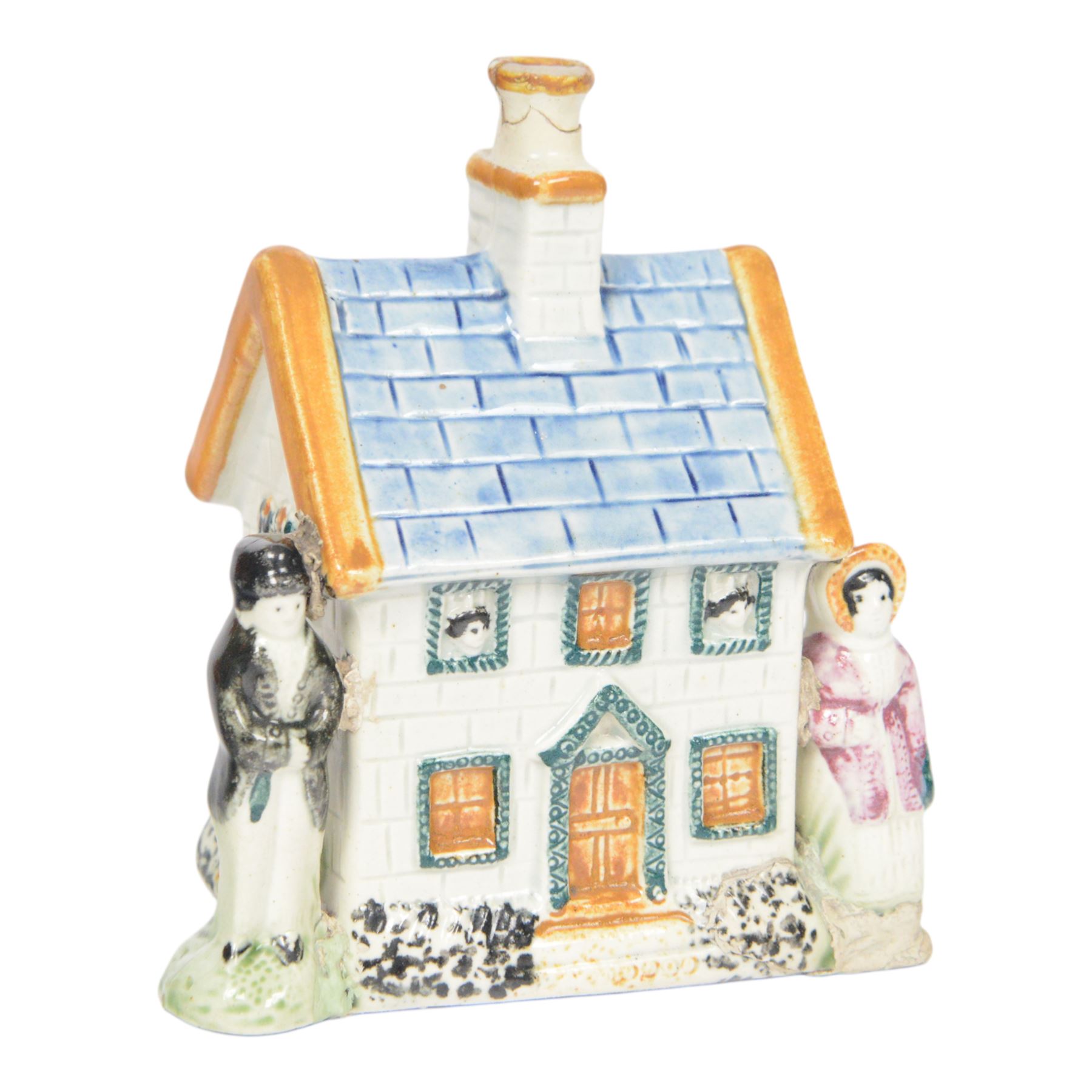 19th Century Staffordshire pearlware Prattware type money box, modelled as a houe with two figures to the front corners, H13cm