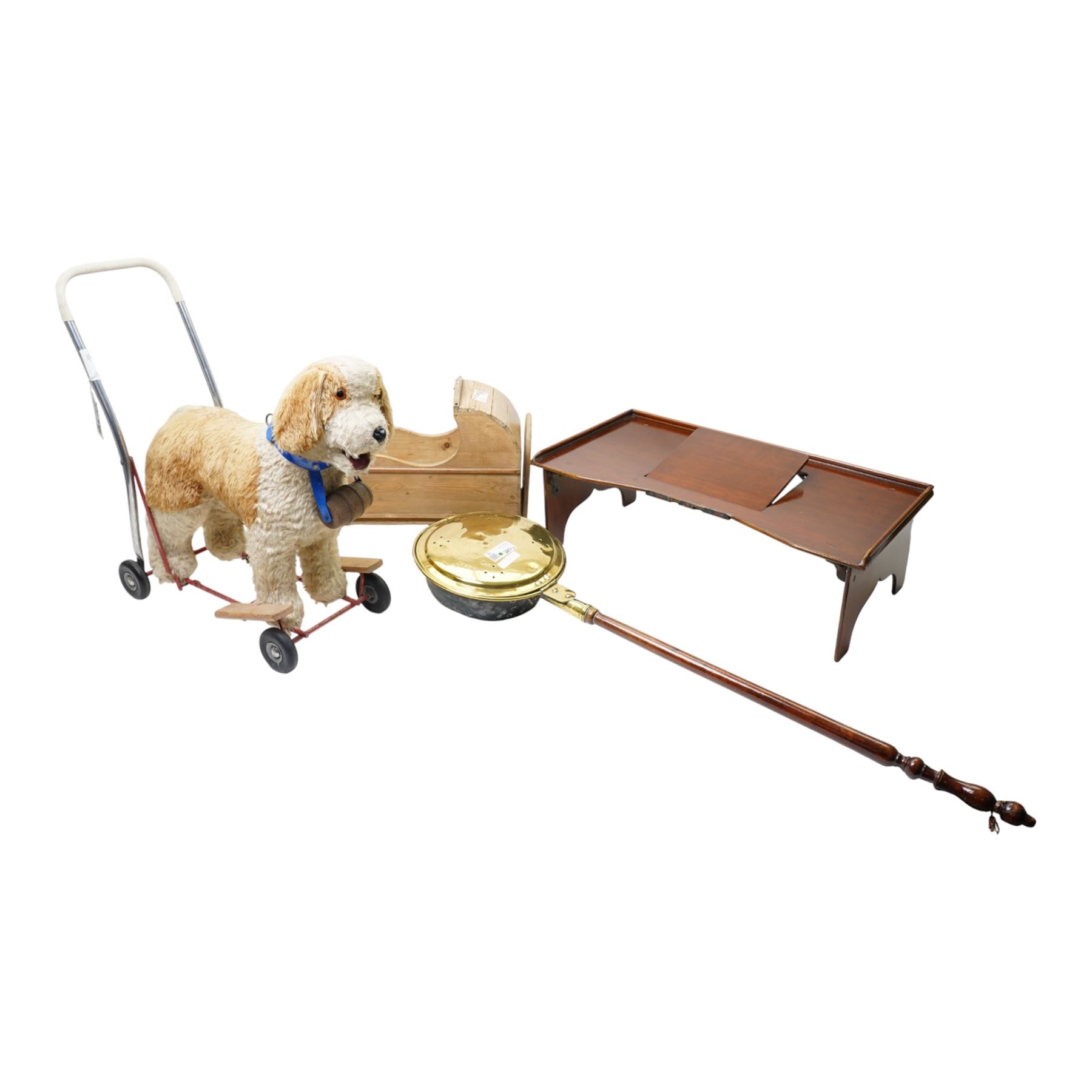 Pine Dolls crib, Pedigree push along rescue dog, warming pan and John Watts mahogany folding tray