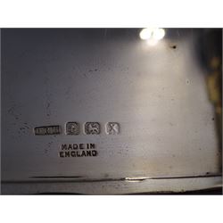 Mid 20th century silver cigarette case, of rectangular form with geometric engraved decoration, hallmarked Dudley Russell Howitt, Birmingham 1947, H8.5cm