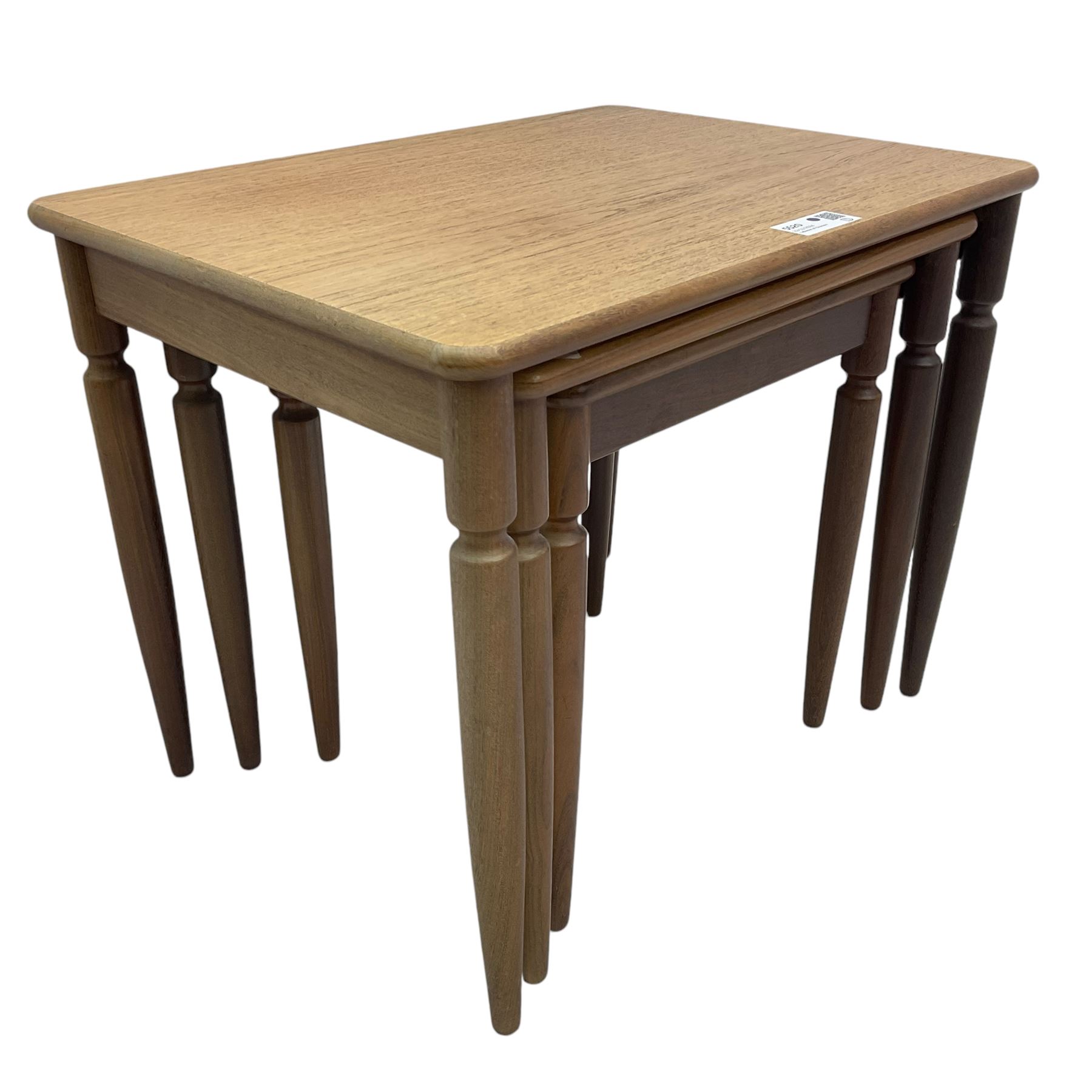 G-Plan - teak nest of three tables, rectangular top raised on turned supports