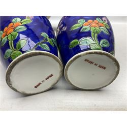 20th Century Japanese vase decorated with a blue dragon and gilding upon red yellow ground, bears Fukagawa Seiji mark (a/f), together with pair of blue cloisonné vases of baluster form decorated with blossom, and pair of Japanese vases, tallest H26cm