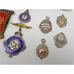  The Royal Antediluvian Order of Buffaloes silver jewels named to Bro. E. Mc Gibbon - Grand Lodge of England silver & enamel, Province of Egypt gilt metal & Ordnance Lodge silver & enamel, Treasurer ribbon and one other silver jewel, three silver medals Cricket Cup Alexandria Brigade 1924, C.G.A.A Tennis 1926 and Pinks' Club Billiards League 1932 and a collection of Regimental Badge collectors cards, stamped to reverse G.P. Wickham Legg   