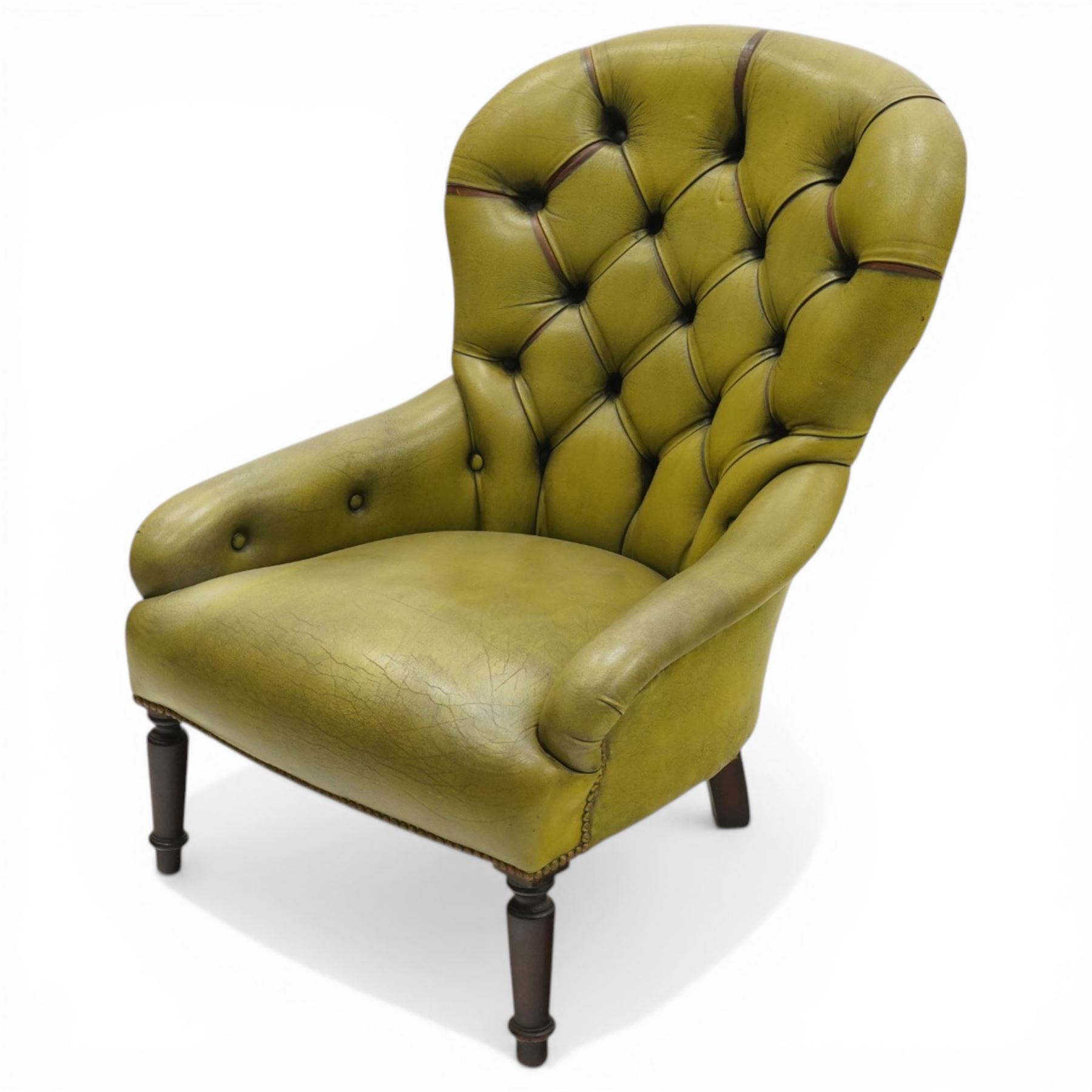 Victorian design tub armchair upholstered in buttoned green leather, on turned front supports