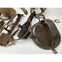 Quantity of animal traps including, gin traps, mole traps, Henri Marty wirework cage trap etc. Auctioneer's Note: These traps are sold as artefacts for ornamental purposes only as the use of some of them is illegal.