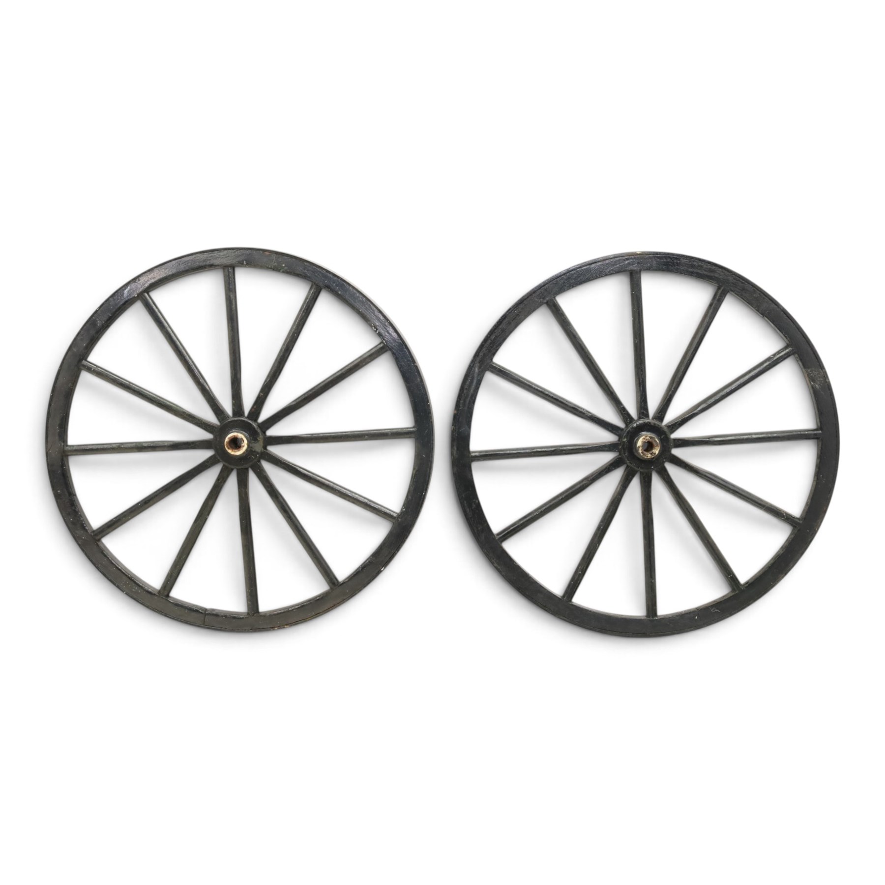 Pair of Victorian black lacquered and painted cartwheels with twelve spokes